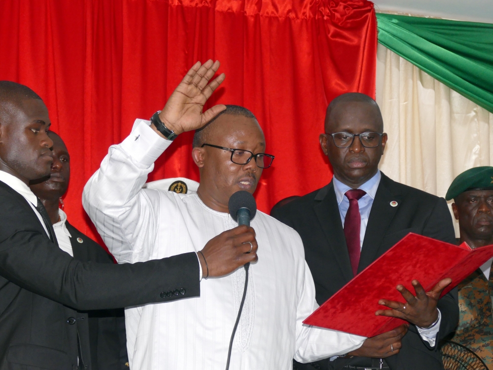 Guinea-Bissau's newly elected president Umaro Cissoko Embalo raises his arm during his swearing-in ceremony in Bissau, Guinea Bissau February 27, 2020. Reuters/Alberto Dabo