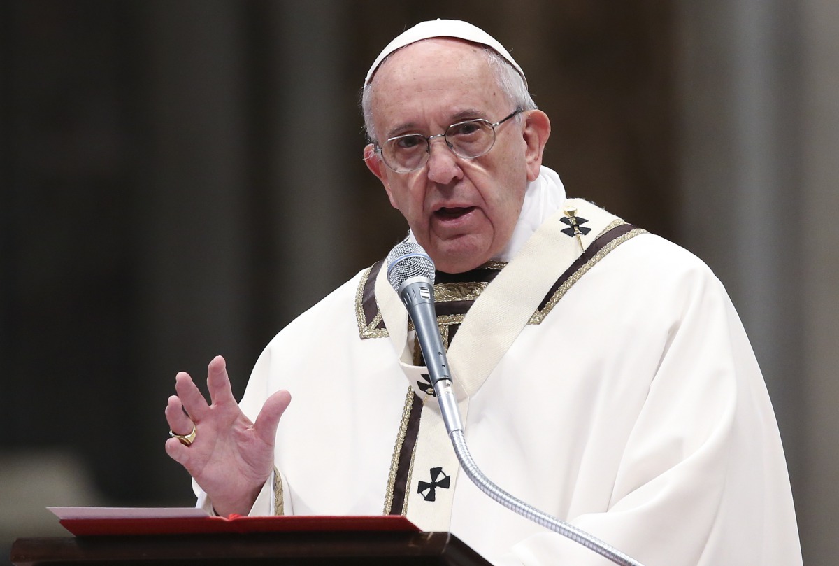 Pope Francis speaks as he leads the Chrismal mass in Saint Peters Basilica at the Vatican in this file photo. Reuters /  Stefano Rellandini
