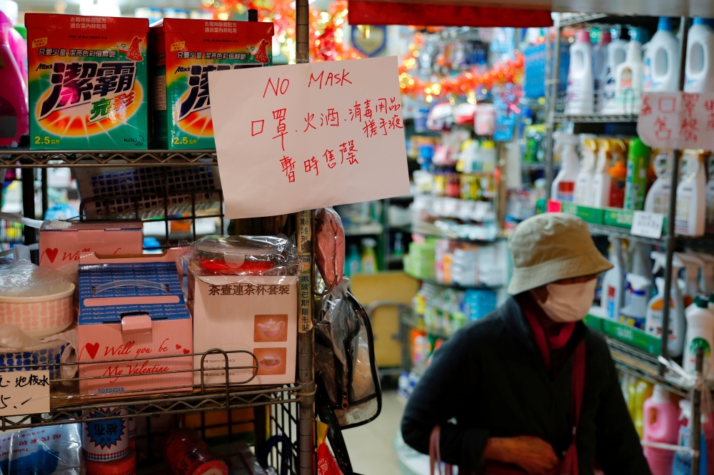 A sign announces that masks are sold out at a grocery store following the outbreak of a new coronavirus, in Hong Kong, China. Reuters / Tyrone Siu
