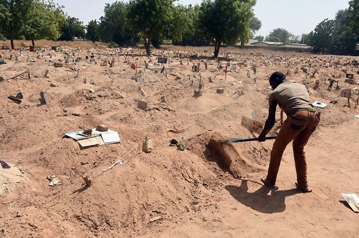 File photo shows a grave-digger at work in Maiduguri