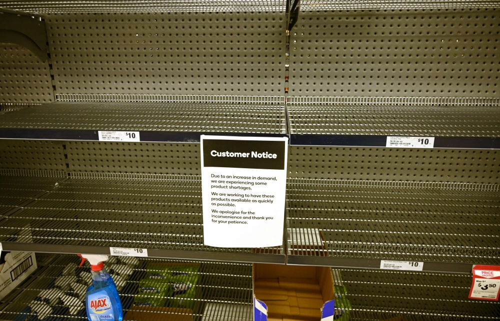 Shelves are empty of hand sanitiser in a supermarket in Sydney on March 4, 2020. AFP / PETER PARKS