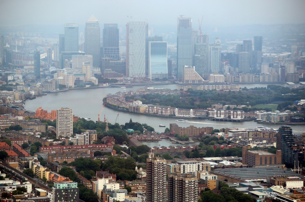 The Canary Wharf financial district is seen from the construction site of 22 Bishopsgate in London, Britain June 25, 2019. Reuters/Hannah McKay