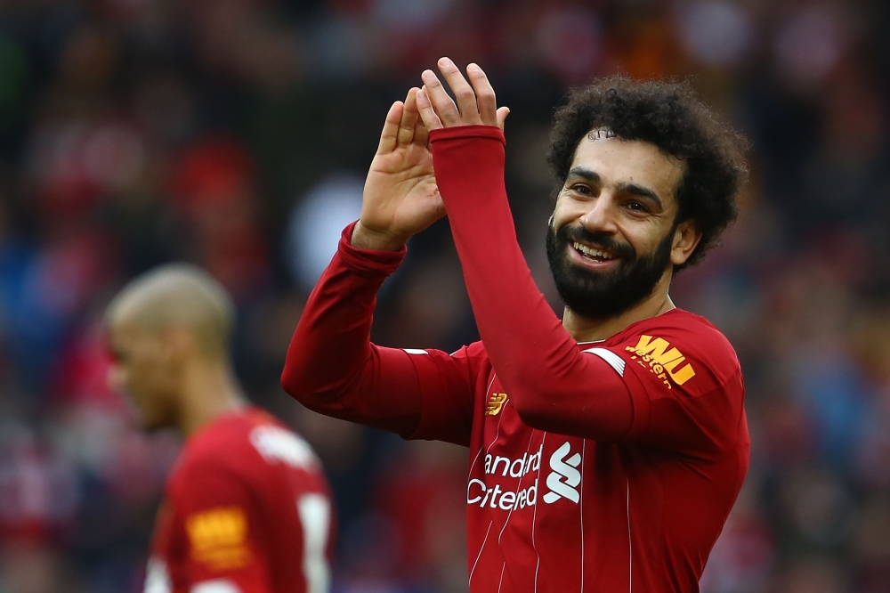 Liverpool's Egyptian midfielder Mohamed Salah reacts at the final whistle during the English Premier League football match between Liverpool and Bournemouth at Anfield in Liverpool, north west England on March 7, 2020. AFP / GEOFF CADDICK