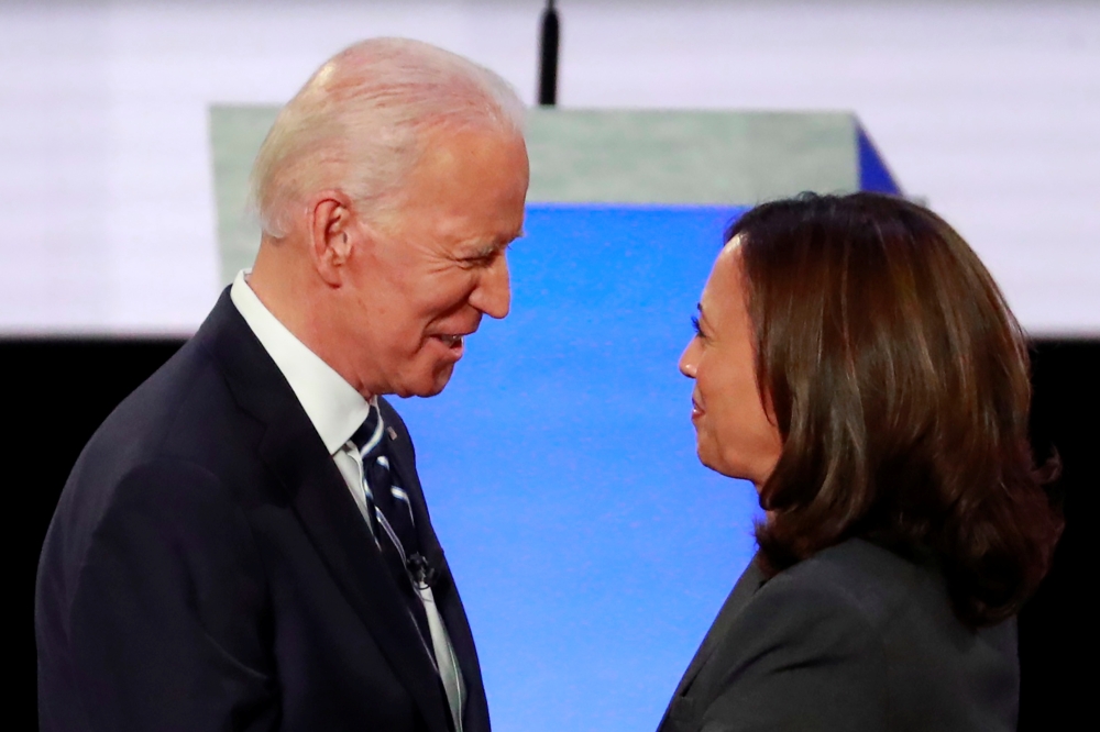 Joe Biden and Kamala Harris take the stage on the second night of the second 2020 Democratic US presidential debate in Detroit, Michigan, in this July 31, 2019 photo. Reuters/Lucas Jackson