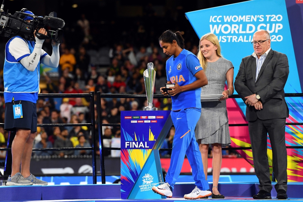 India's captain Harmanpreet Kaur walks past the trophy during the ceremony of the Twenty20 women's cricket World Cup final between Australia and India in Melbourne on March 8, 2020./ AFP / William WEST /

