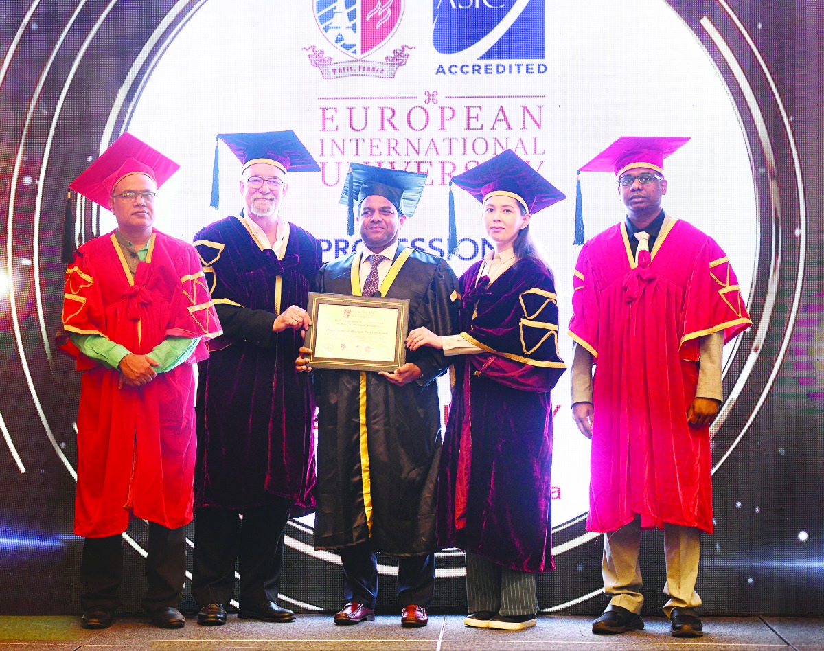 Mohamed Althaf, Director of Lulu Hypermarkets, receiving the doctoral certificate during a ceremony in Paris, France.