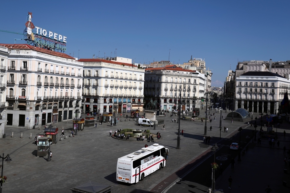  General view of the famous landmark Puerta del Sol with few people due to the coronavirus outbreak in central Madrid, Spain, March 14, 2020. REUTERS/Sergio Perez 