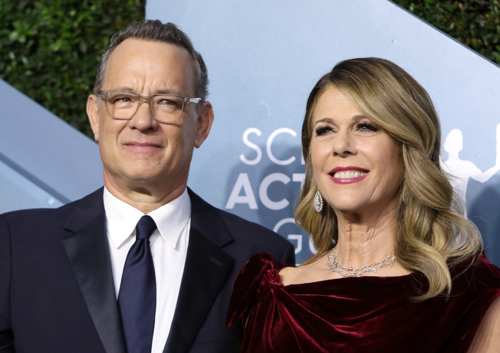 FILE PHOTO: Tom Hanks and Rita Wilson arrive at the 26th Screen Actors Guild Awards in Los Angeles, California, U.S., January 19, 2020 REUTERS/Monica Almeida/File Photo