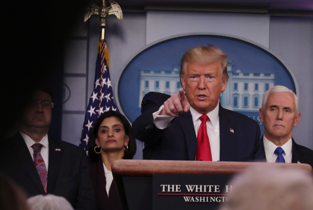 U.S. President Donald Trump answers a question during the daily White House coronavirus response briefing with members of the administration's coronavirus task force at the White House in Washington, U.S., March 18, 2020. REUTERS/Jonathan Ernst