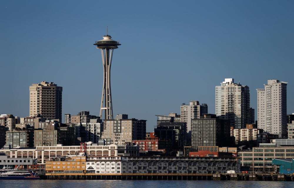 The Space Needle and the Seattle waterfront is seen from Elliott Bay during the outbreak of coronavirus disease (COVID-19) in Seattle, Washington, U.S. March 18, 2020. Picture taken March 18, 2020. REUTERS/Lindsey Wasson
