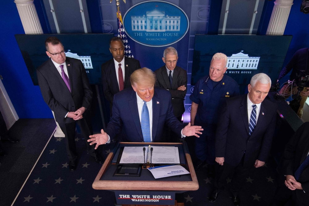 US President Donald Trump speaks during the daily briefing on the novel coronavirus, COVID-19, at the White House on March 21, 2020, in Washington, DC. / AFP / JIM WATSON