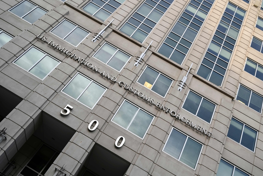 In this file photo taken on May 9, 2019 a US Immigration and Customs Enforcement building is seen in Washington, DC. / AFP / EVA HAMBACH
