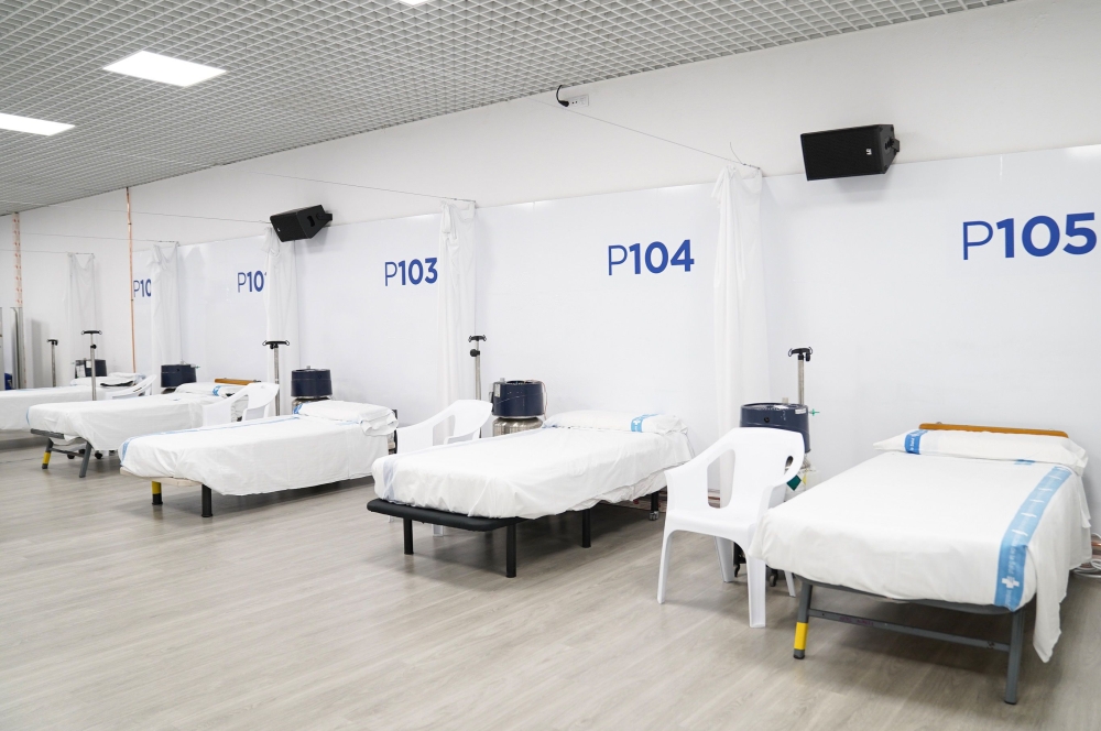 This handout image released by Barcelona City Hall on March 29, 2020 shows beds at the extension of the Vall d'Hebron Hospital in Barcelona, set-up for coronavirus patients. AFP