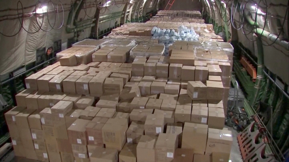 Boxes with medical equipment and masks to help fight coronavirus disease (COVID-19) are seen on board a Russian military transport plane ahead of its departure to the United States of America, at an airdrome outside Moscow, Russia April 1, 2020, in this s