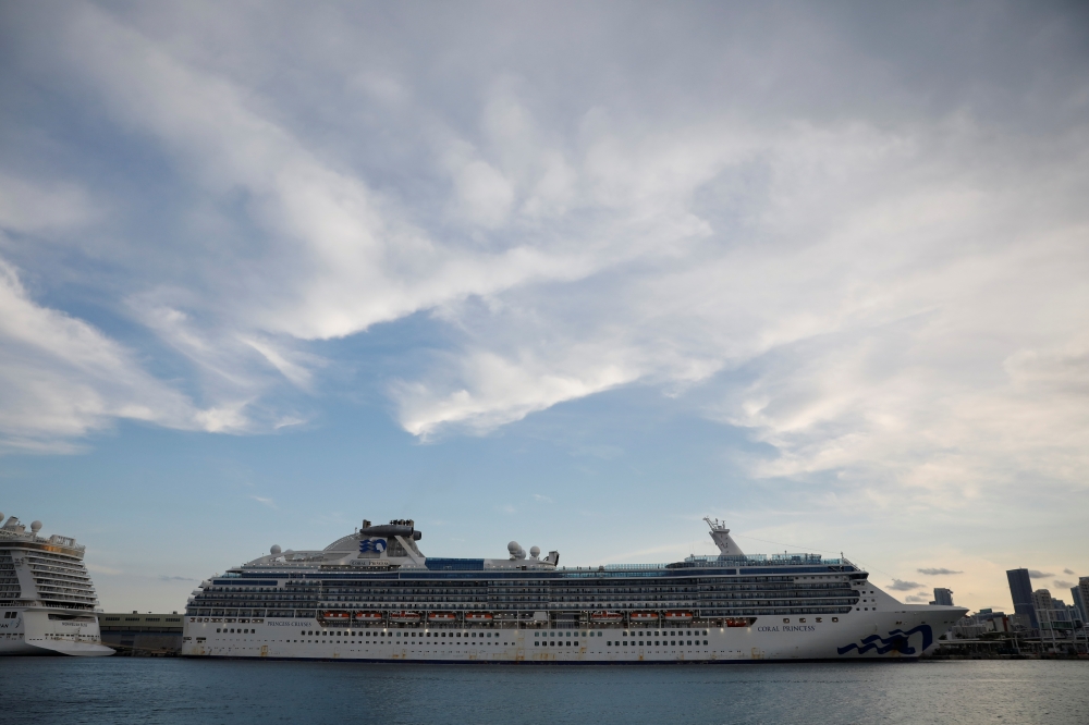 A view of the Coral Princess ship, of Princess Cruises fleet, with patients affected by coronavirus disease (COVID-19), as it docks at Miami Port, in Miami, Florida, U.S., April 4, 2020. REUTERS/Marco Bello
