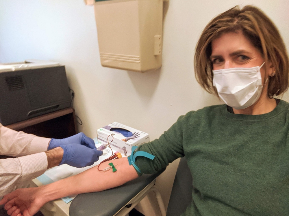 This image courtesy of Diana Berrent shows her getting her blood drawn at pathology laboratory at Columbia University Irving Medical Center on March 30, 2020 in New York. AFP PHOTO / Diana Berrent