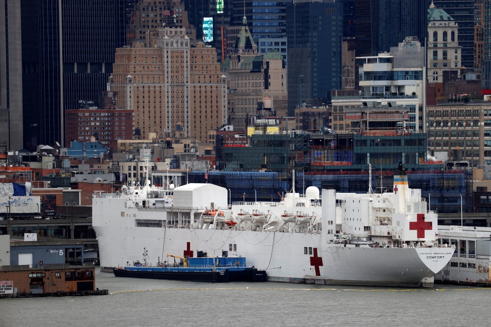 The USNS hospital ship Comfort is seen docked at Pier 90 on Manhattan's West Side during the outbreak of the coronavirus disease (COVID-19) in new york City, new york, U.S., April 3, 2020. REUTERS/Mike Segar