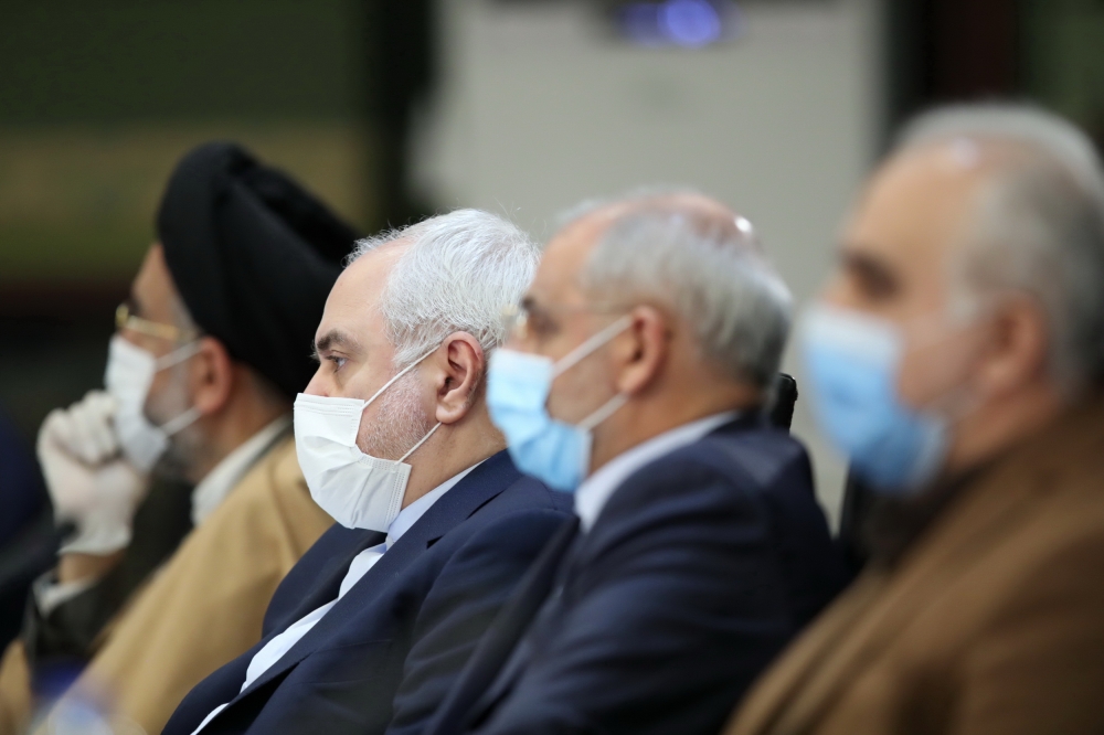 Foreign Affairs Minister of Iran Mohammad Javad Zarif (3rd R) attends the National Committee Against the Coronavirus (COVID-19) with medical mask in Tehran, Iran on April 08, 2020.  Iranian Presidency/Anadolu