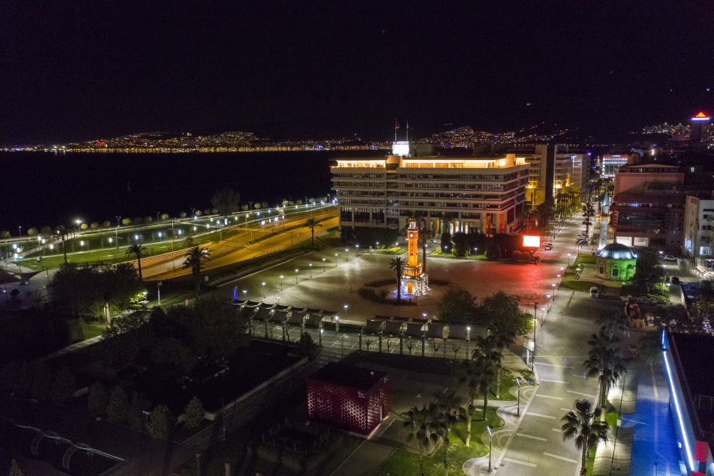 IZMIR, TURKEY - APRIL 12: A drone photo shows empty roads around Clock Tower in Konak district after a two-day curfew imposed to stem the spread of the coronavirus (COVID-19) in Izmir, Turkey on April 12, 2020. ( Mehmet Emin Mengüarslan - Anadolu Agency )