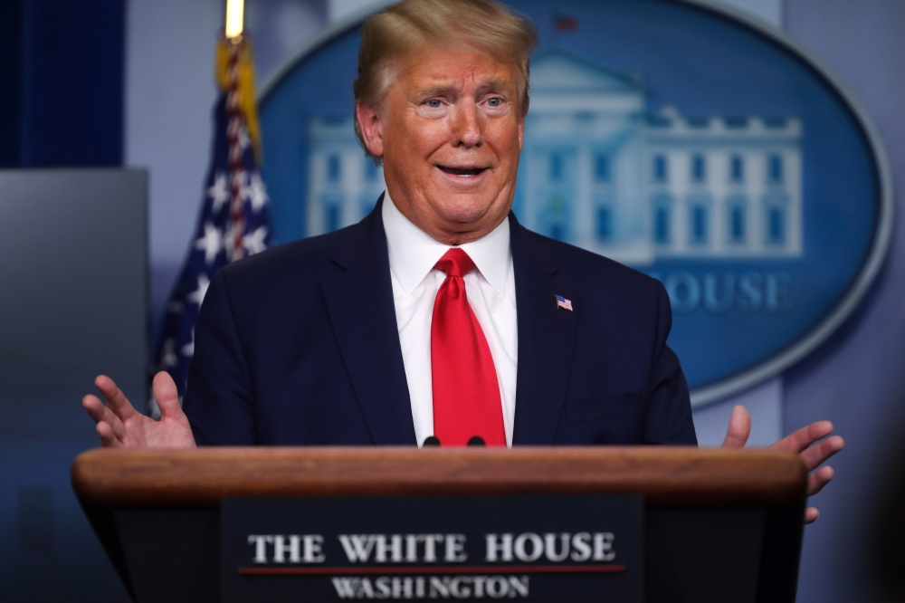 U.S. President Donald Trump answers a question during the daily coronavirus task force briefing at the White House in Washington, U.S., April 20, 2020. REUTERS/Jonathan Ernst
