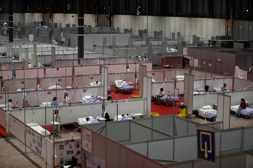 MADRID, SPAIN - APRIL 21: A general view of IFEMA field hospital adapted from a convention and fair center in order to alleviate the burden of the hospitals due to the novel coronavirus (COVID-19) pandemic is seen in Madrid, Spain on April 21, 2020. ( Bur