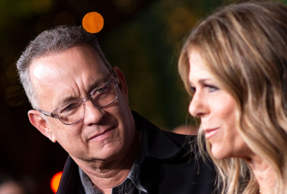(FILES) In this file photo taken on November 07, 2018 Actors Tom Hanks (L) and his wife actress/singer Rita Wilson attend 