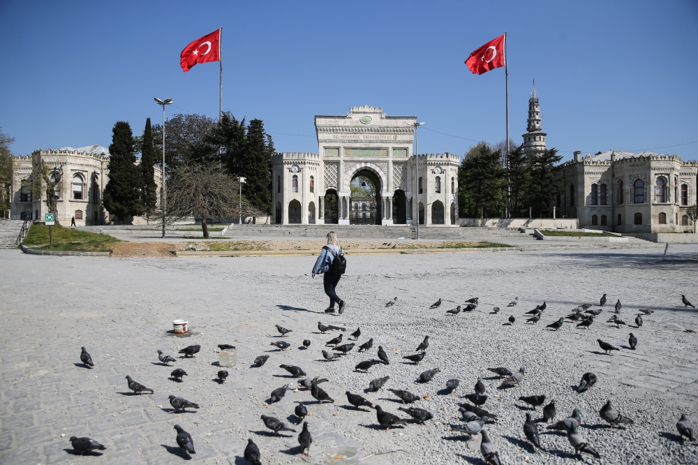 Beyazit Square which is one of the most tourist attraction places, and its surroundings are seen empty with a flock of pigeons due to precautionary measures taken against the novel coronavirus (COVID-19) pandemic in Istanbul, Turkey on April 28, 2020. ( E