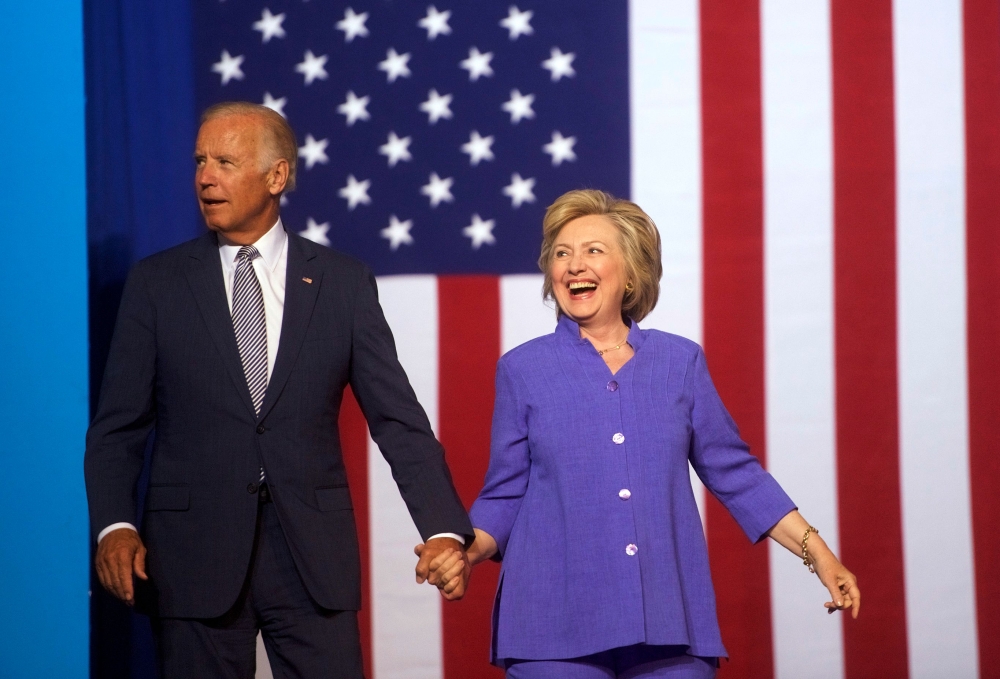 (FILES) In this file photo taken on August 15, 2016, presidential nominee Hillary Clinton holds a rally with US Vice President Joe Biden at Riverfront Sports athletic facility in Scranton, Pennsylvania. AFP / / Mark Makela