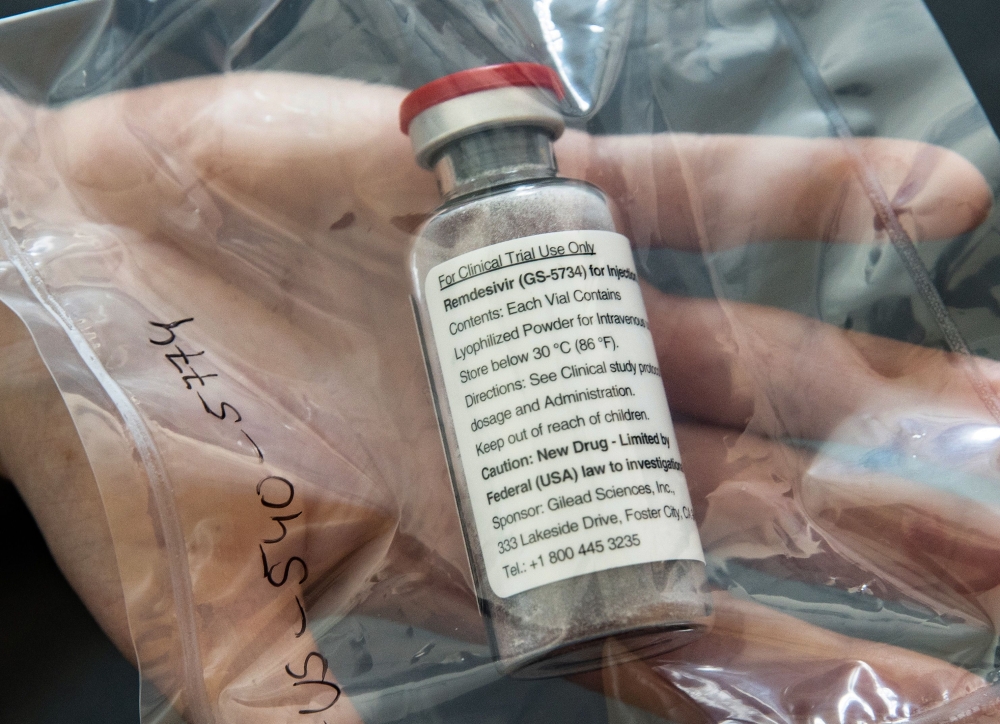 (FILES) In this file photo taken on April 8, 2020, one vial of the drug Remdesivir lies during a press conference. AFP / POOL / Ulrich Perrey