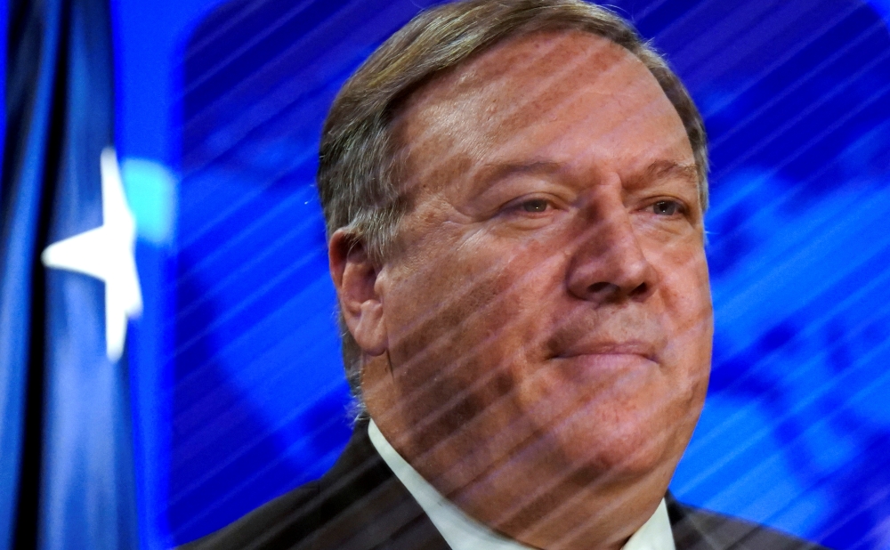 U.S. Secretary of State Mike Pompeo speaks about the coronavirus disease (COVID-19) during a media briefing at the State Department in Washington, U.S., May 6, 2020. REUTERS/Kevin Lamarque/Pool
