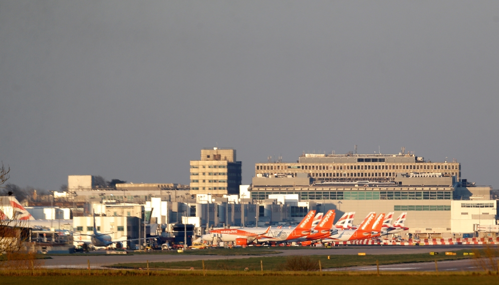 FILE PHOTO: Easyjet and British Airways planes are pictured at Gatwick airport as the spread of the coronavirus disease (COVID-19) continues, Gatwick Airport, Britain, March 23, 2020. REUTERS/Peter Nicholls/File Photo
