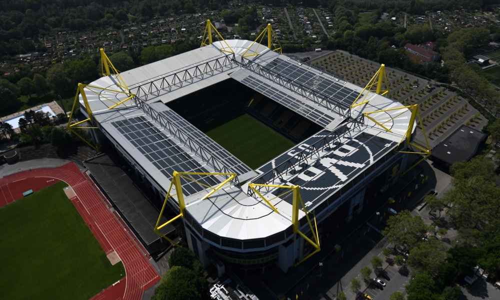 This aerial view shows the Signal Iduna Park of the Bundesliga club Borussia Dortmund in Dortmund, western Germany, on May 8, 2020. / AFP / Ina FASSBENDER