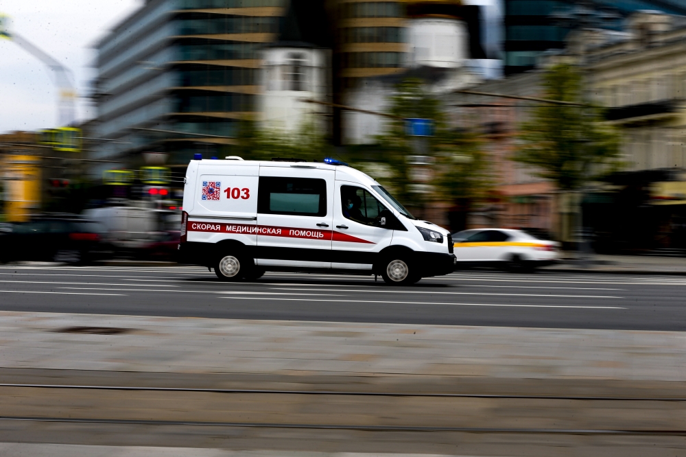 MOSCOW, RUSSIA - MAY 12: An ambulance is seen in a street as the coronavirus death toll has reached to 2,116 with 232,243 confirmed cases in Moscow, Russia on May 12, 2020. ( Sefa Karacan - Anadolu Agency )