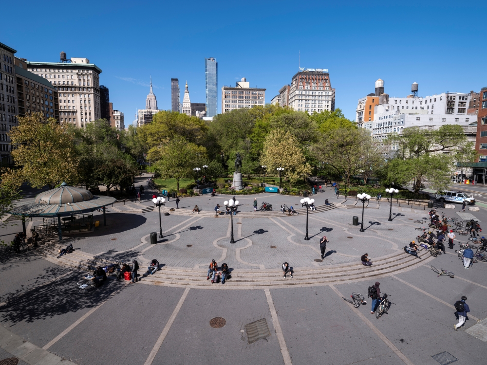 A group of bicyclists and a handful of pedestrians mingle in Union Square as streets remain less busy due to the continuing outbreak of the coronavirus disease (COVID-19) in the Manhattan borough of New York U.S., May 5, 2020. Picture taken May 5, 2020 at