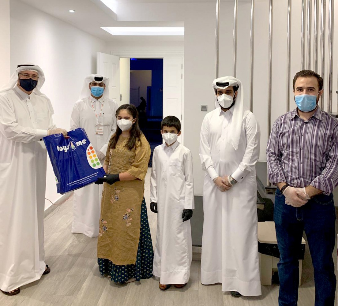Ashraf Abu Issa (left), Chairman of Abu Issa Holding and its subsidiary, Toys4Me, with other officials distributing gifts among children who are in quarantine.