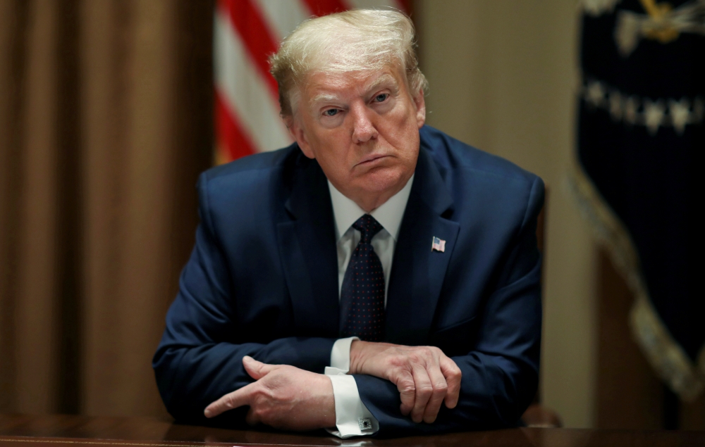 :FILE PHOTO: U.S. President Donald Trump holds a meeting on 