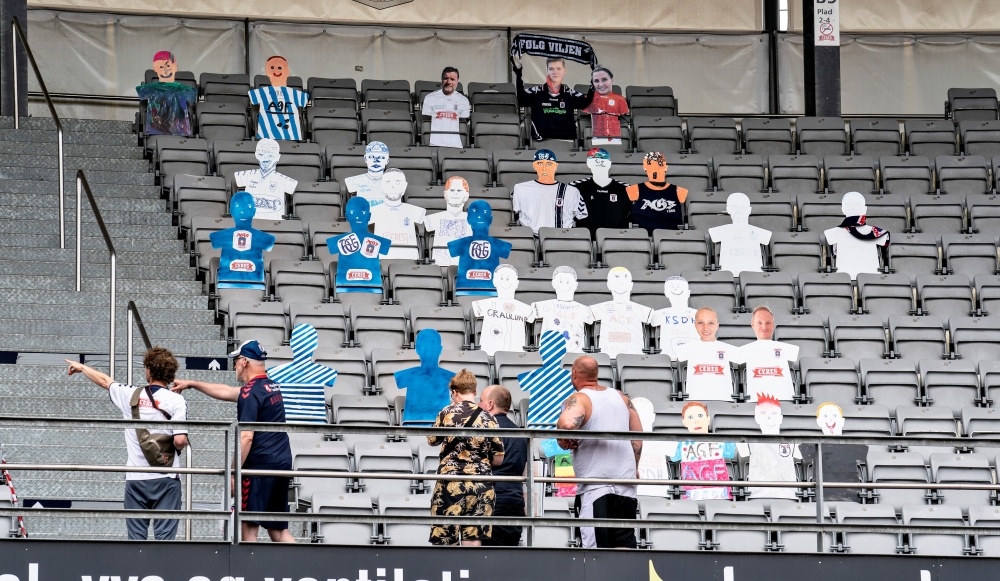 Cardboard figures with pictures of the fans are placed in the seats as Ceres Park Football Stadium is being prepared for the Danish Superliga match between AGF and Randers FC to be streamed via the video platform Zoom, in Aarhus, Denmark May 27, 2020. Rit