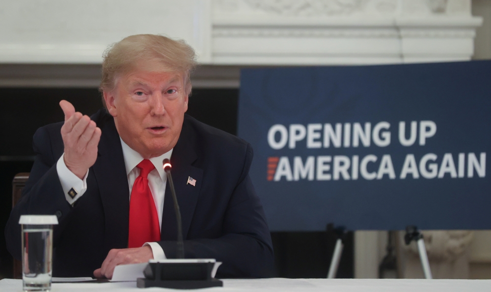 U.S. President Donald Trump speaks during a roundtable discussion with industry executives on reopening businesses during the coronavirus disease (COVID-19) pandemic in the State Dining Room at the White House in Washington, U.S., May 29, 2020. REUTERS/Jo