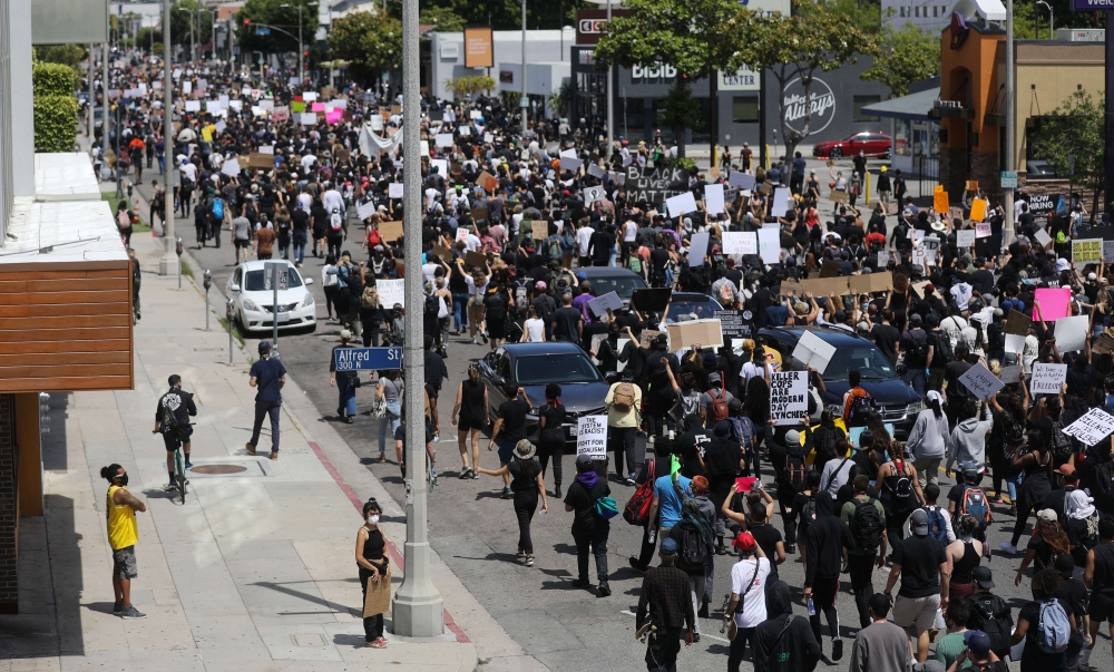LOS ANGELES, CALIFORNIA - MAY 30: Protestors march during a demonstration organized by Black Lives Matter following the death of George Floyd on May 30, 2020 in Los Angeles, California. Mario Tama/Getty Images/AFP 