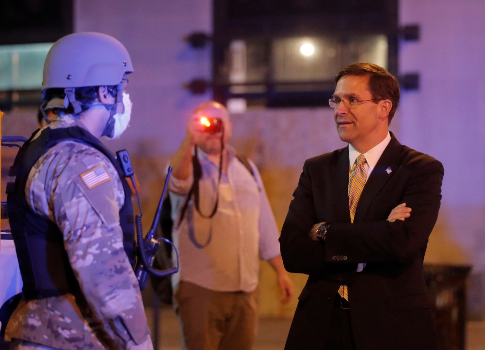 U.S. Defense Secretary Mark Esper visits DC National Guard military officers guarding the White House amid nationwide unrest following the death in Minneapolis police custody of George Floyd, in Washington, U.S., June 1, 2020. (REUTERS/Carlos Barria)