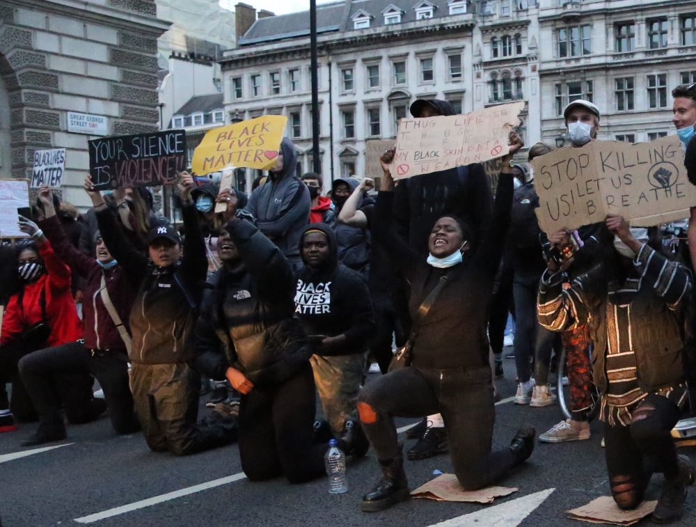 LONDON, ENGLAND - JUNE 03: Protesters take to the streets to march in solidarity with the Black Lives Matter (BLM) movement and protest the killing of George Floyd, an unarmed black man who died last week after being pinned down by a white police officer 