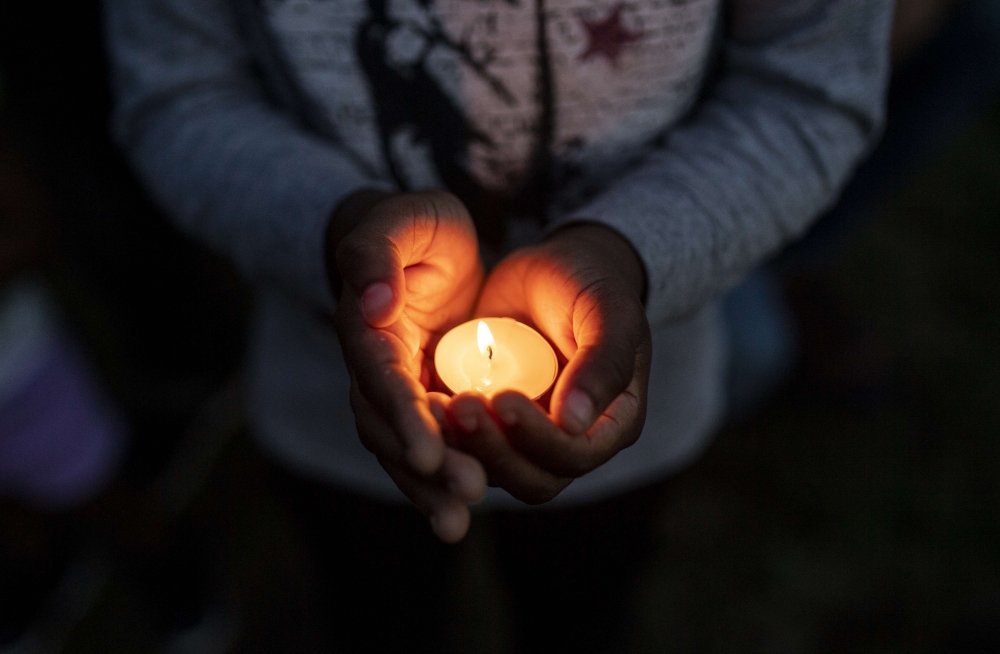 People attend a candle light vigil in memory of George Floyd and others who were killed by police on June 7, 2020 in Minneapolis, Minnesota. Stephen Maturen/Getty Images/AFP
