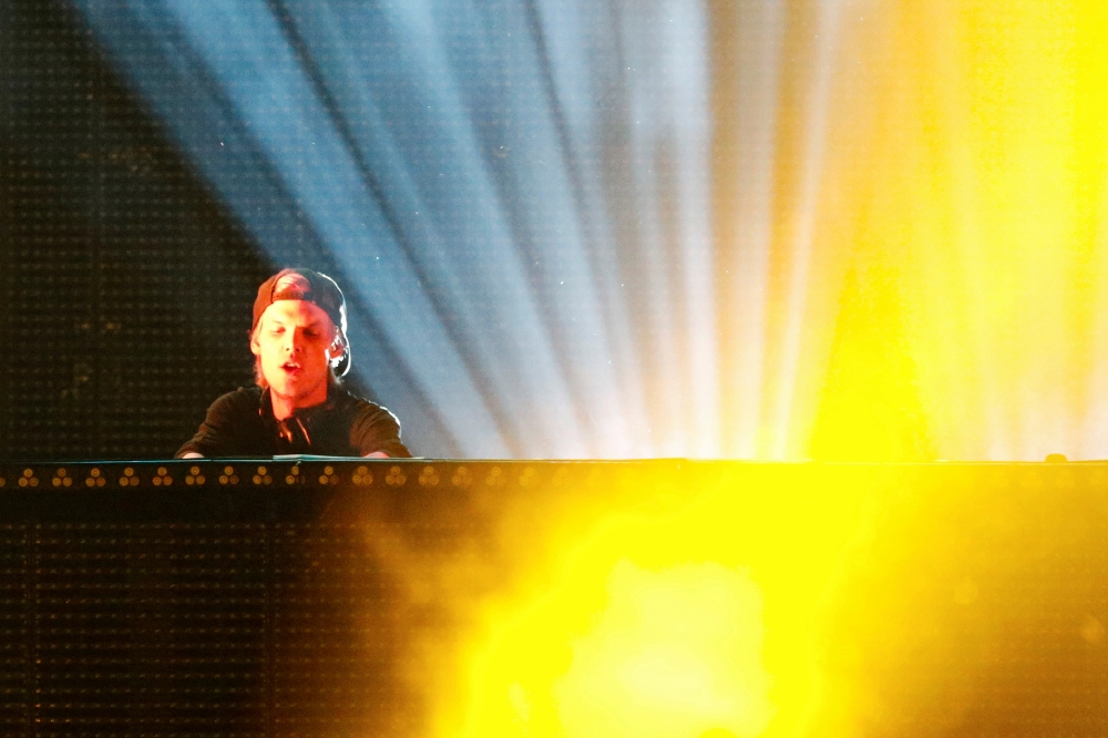 FILE PHOTO: DJ Avicii performs during a concert at Brooklyn's Barclay's Center in New York June 28, 2014. REUTERS/Eduardo Munoz/File Photo

