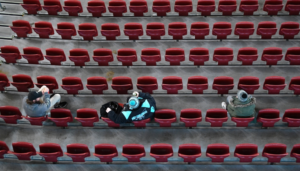 Fans sit with social distancing for an Australian Football League (AFL) match between the Port Adelaide Power and Adelaide Crows amidst the easing of the coronavirus disease (COVID-19) restrictions at Adelaide Oval in Adelaide, Australia, June 13, 2020. A