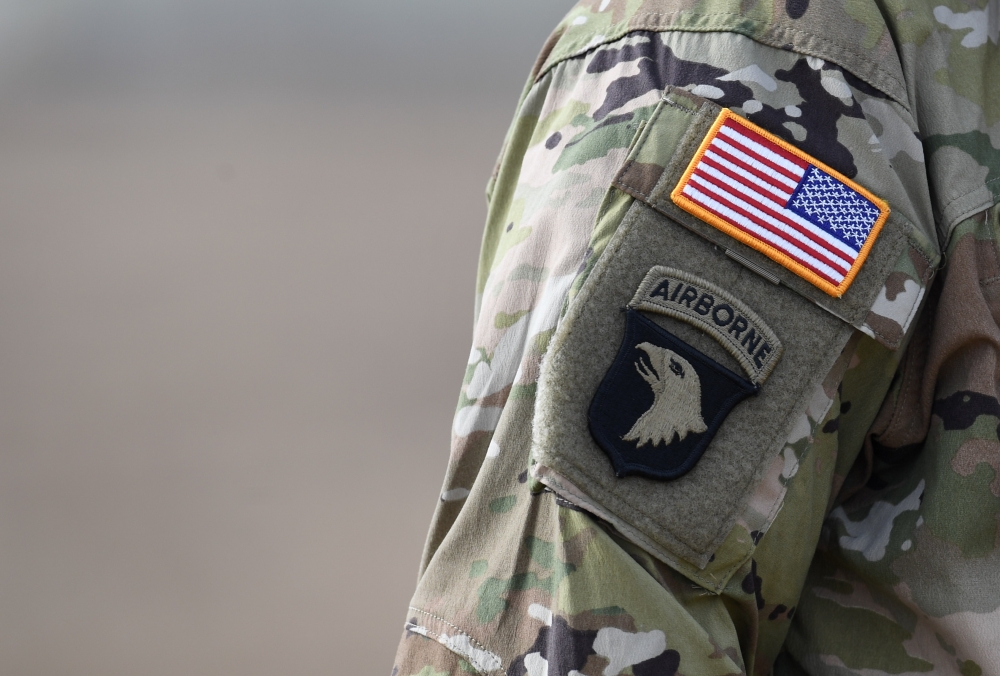 (FILES) In this file photo taken on March 07, 2018 a US flag is pictured on a soldier's uniform during the 'Dynamic Front 18' exercise in Grafenwoehr, near Eschenbach, southern Germany. AFP / CHRISTOF STACHE