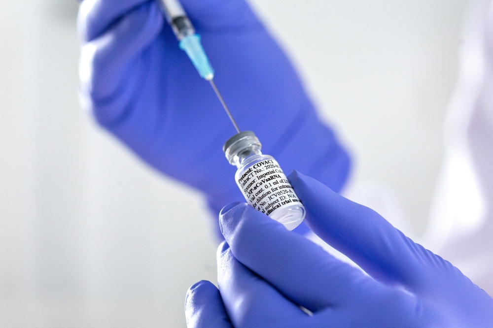 A vial with potential vaccine for the coronavirus disease (COVID-19) is pictured at the Imperial College London, London, Britain June 10, 2020, Picture taken June 10, 2020. Imperial College London/Thomas Angus/via REUTERS