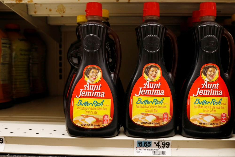 Bottles of Aunt Jemima branded syrup stand on a store shelf inside of a shop in the Brooklyn borough of New York City, New York, U.S., June 17, 2020. REUTERS/Brendan McDermid
