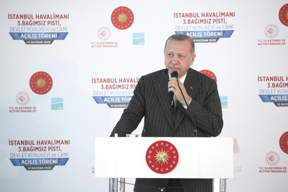 Turkish President Recep Tayyip Erdogan speaks during opening ceremony of the 3rd runway of Istanbul Airport, the state guest house and the mosque in Istanbul, Turkey on June 14, 2020. ( Serhat Ça?da? - Anadolu
