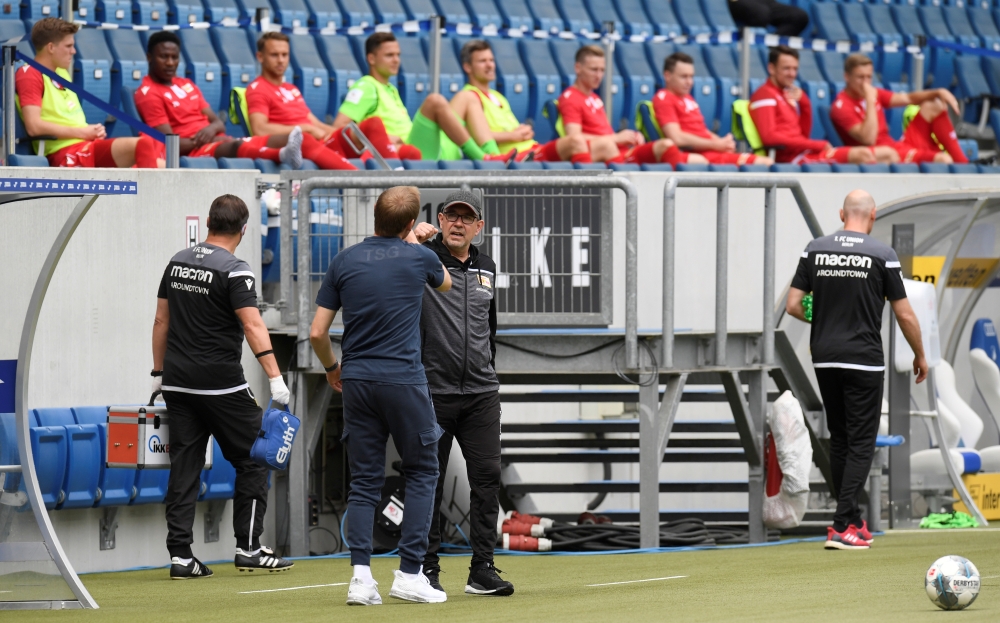 Union Berlin coach Urs Fischer with Hoffenheim coach Matthias Kaltenbach before the match, following the resumption of play behind closed doors after the outbreak of the coronavirus disease (COVID-19) Thomas Kienzle