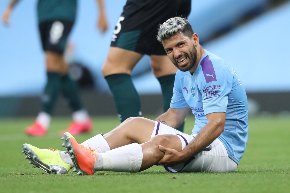FILE PHOTO:  Manchester City's Sergio Aguero reacts after sustaining an injury. Martin Rickett